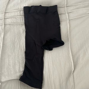 Left leg bare- skims shape wear for dress with a slit. Brand new no tag